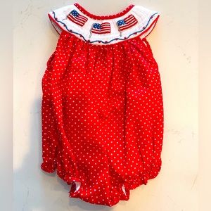 3M Smockingbird American flag onesie with red and white polka dots